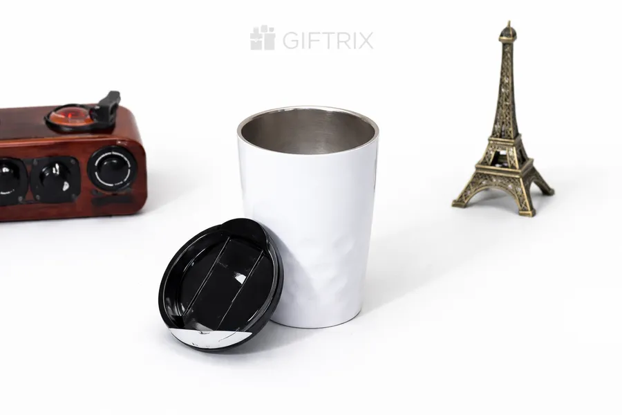 White commute tumbler with black lid